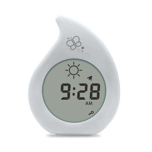 Digital clock with a white casing on a white background