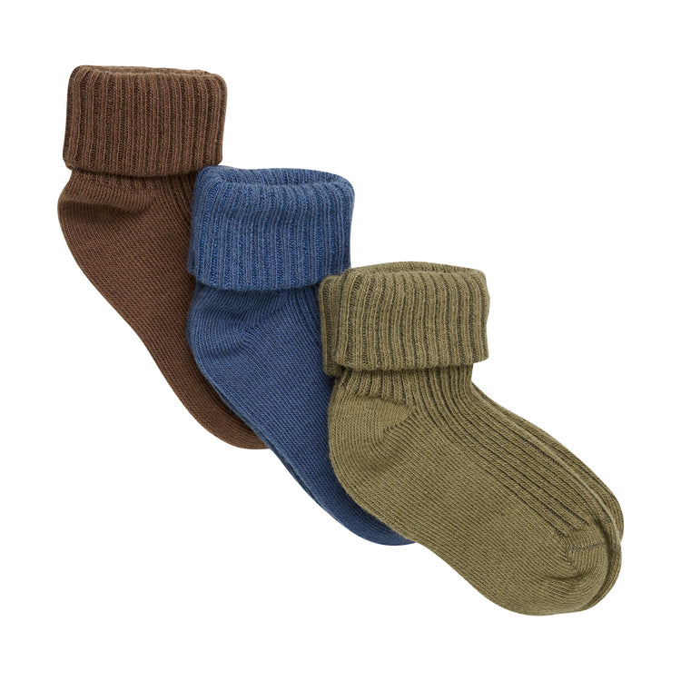 Three pairs of baby socks in brown, blue, and green on a white background