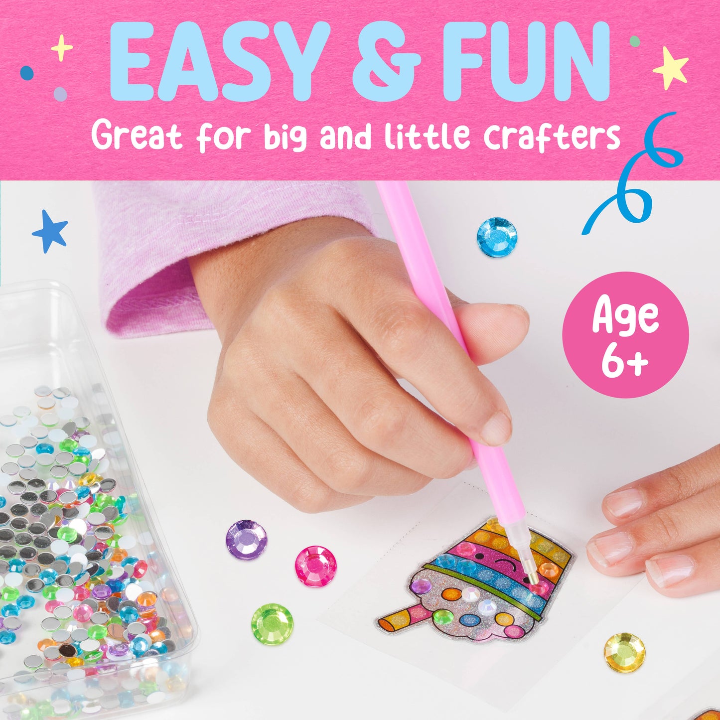 Crafting activity kit with glitter and a pink tool, suitable for ages 6 and up.