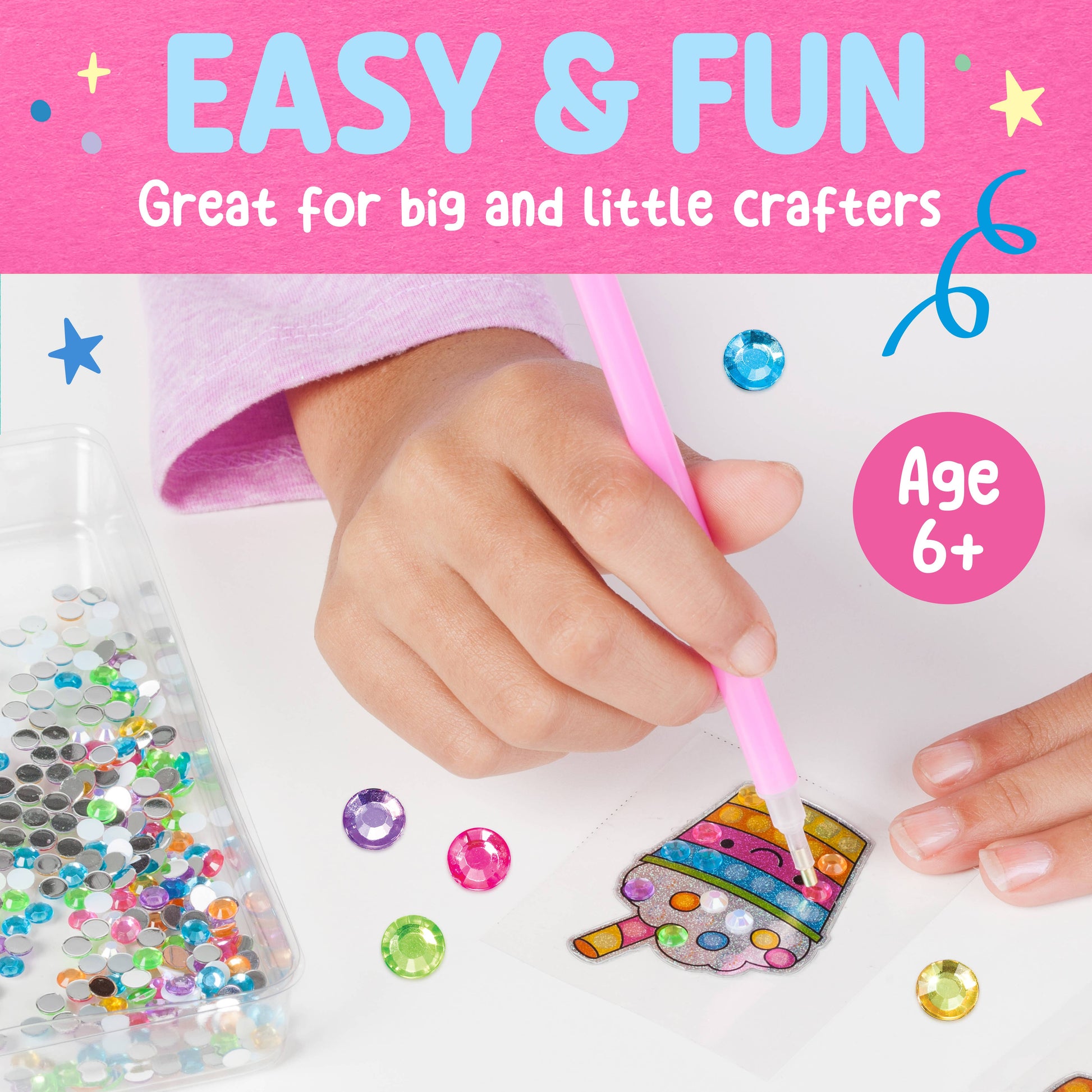 Crafting activity kit with glitter and a pink tool, suitable for ages 6 and up.