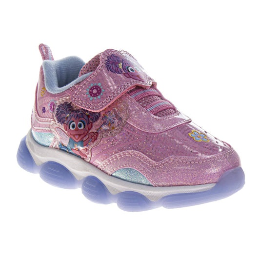 Pink children's shoe with character design on a white background 2