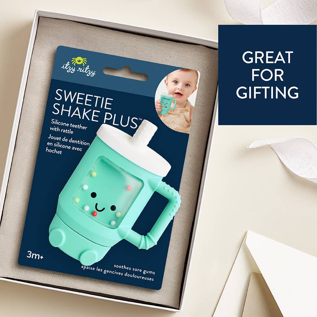 Silicone teether packaging with 'Itzy Ritzy' branding on a beige background
